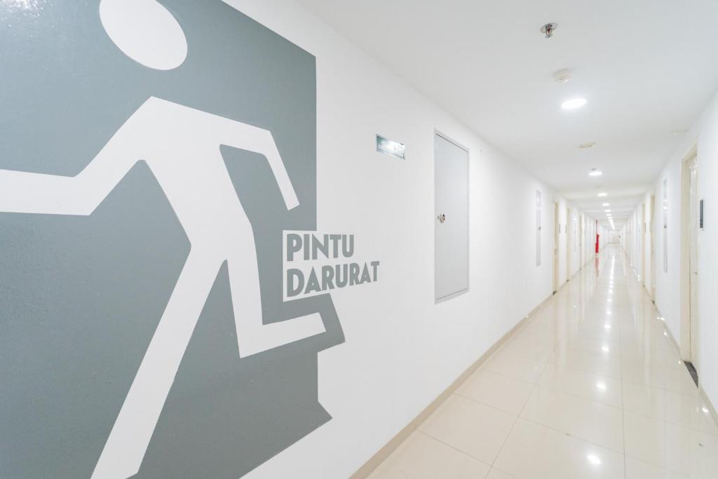 RedLiving Apartemen Patra Land Urbano - Happy Rooms Tower Mid-West with Netflix photo 2