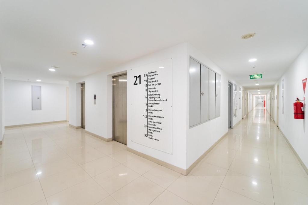 RedLiving Apartemen Patra Land Urbano - Happy Rooms Tower Mid-West with Netflix photo 1