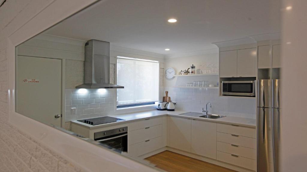 Marlin Waters Unit 2 walk to beach and river Bermagui photo 3