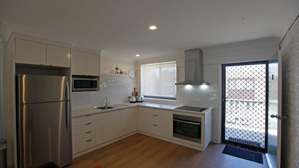 Marlin Waters Unit 2 walk to beach and river Bermagui photo 4