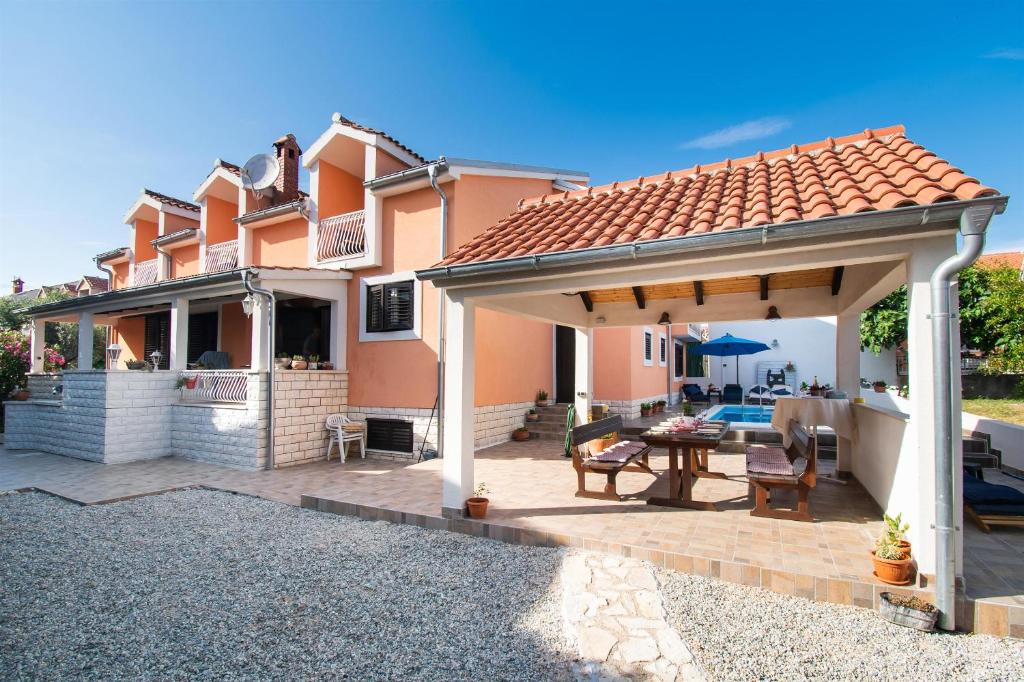 Apartments and Room Agiss with pool photo 2
