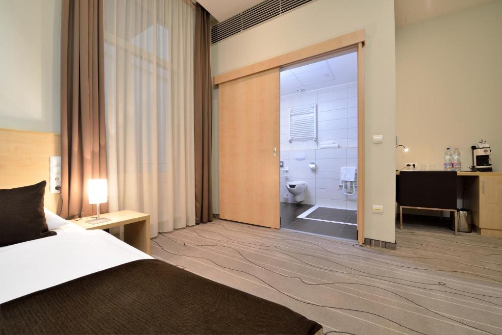 Promenade Hotel by Mellow Mood Hotels - Tap to explore photos