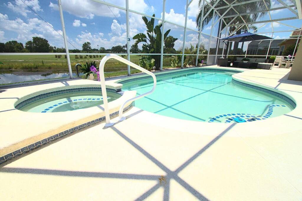 Entire home with pool and lake view and Golf course by Disney photo 4