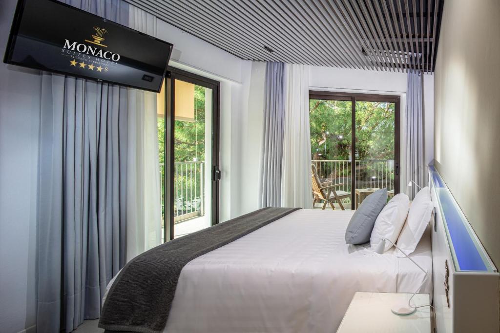 Monaco Suites Hotel - Tap to explore photos