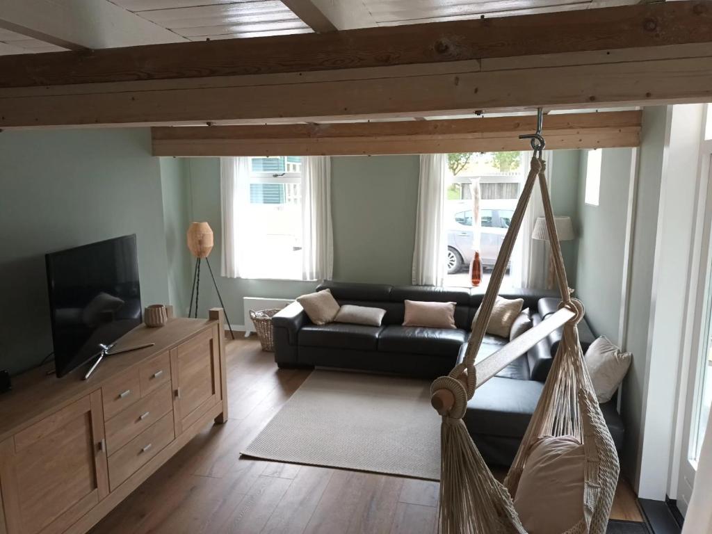 'Vakantiehuisje Natuurlijk! - nabij molen, meer, strand & stad' photo 1