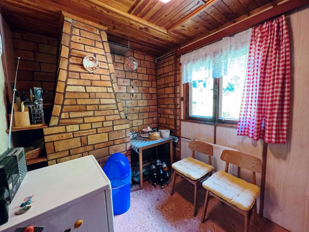Hunting lodge under the rock and the river Kretinka photo 3