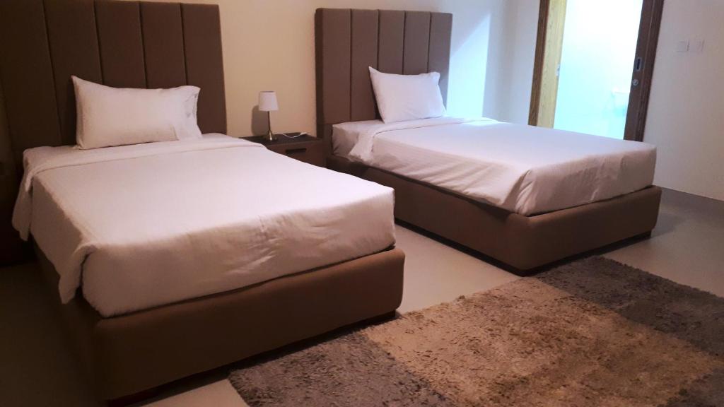 Magnum Hotel & Suites West Bay photo 3