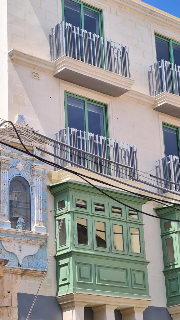 Privilege Suit SLiema - Tap to explore photos