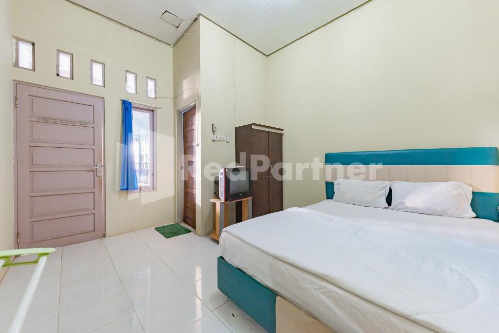 Ana Guest House Syariah Mitra RedDoorz photo 3