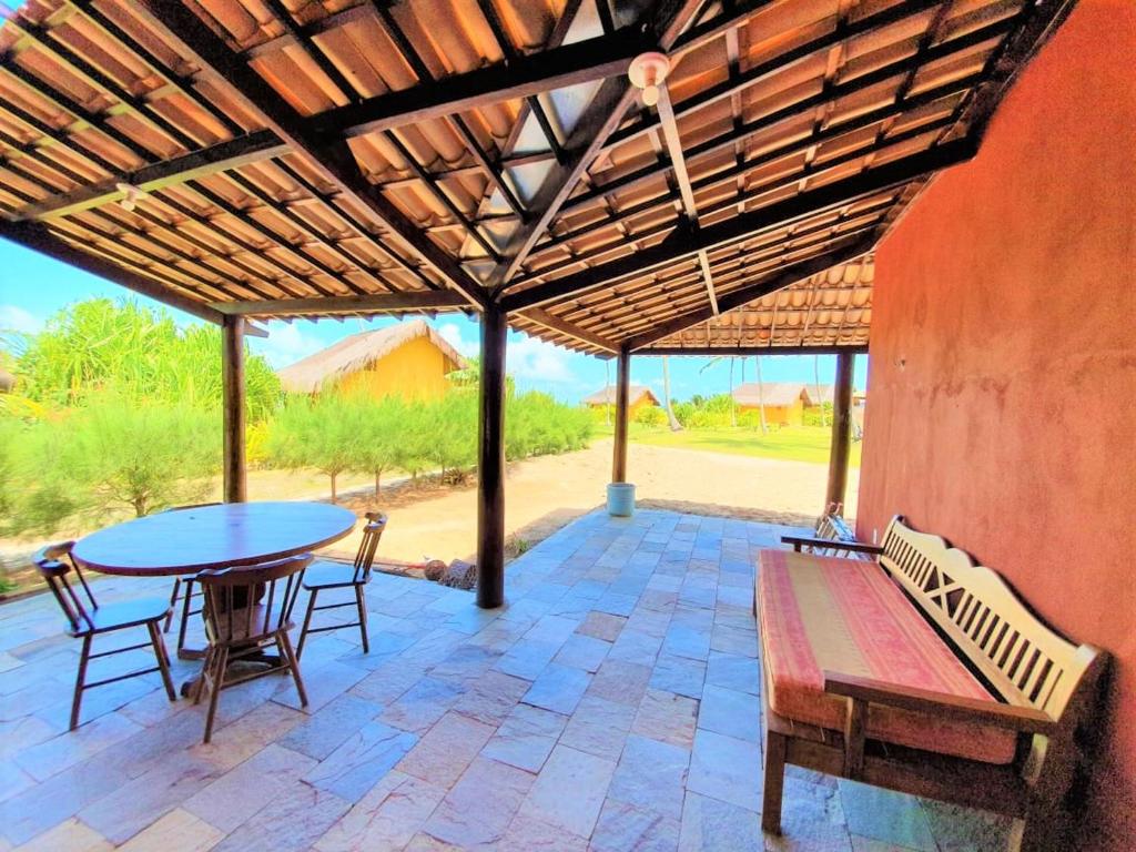 Casa 110m2 beira mar - 2 quartos - Condomínio Bouganville Piscina 25m e ampla área verde -S Miguel do Gostoso photo 4