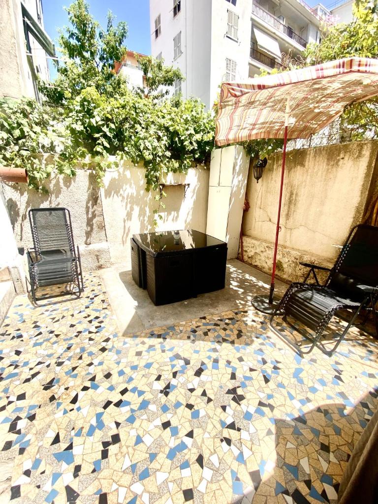 Grand T2 en Rez-de-jardin et petite place de parking