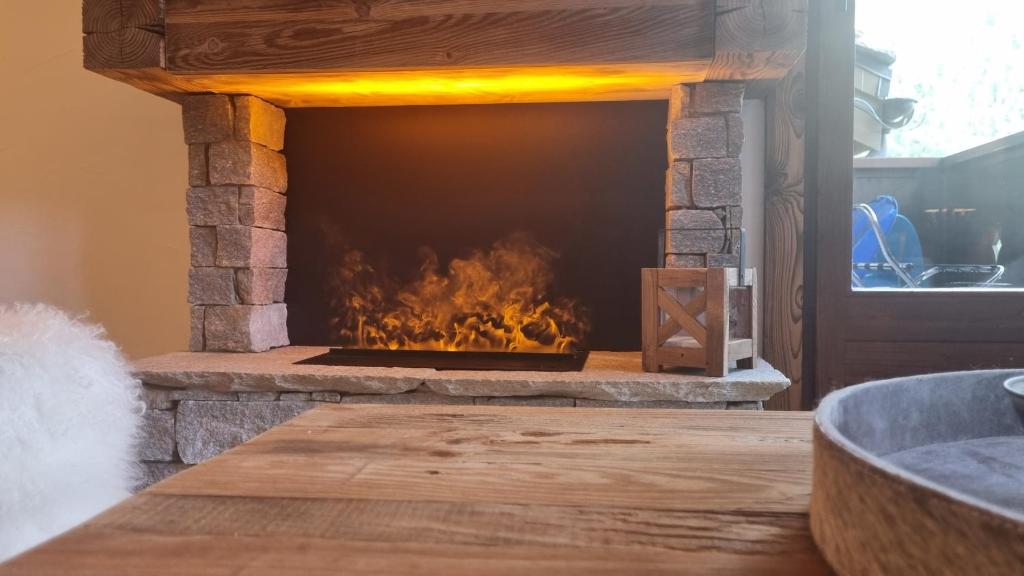 Arcs 1950 Appartement Luxe type chalet 5 à 7 personnes Vue imprenable sur le Montblanc skis aux pieds photo 3