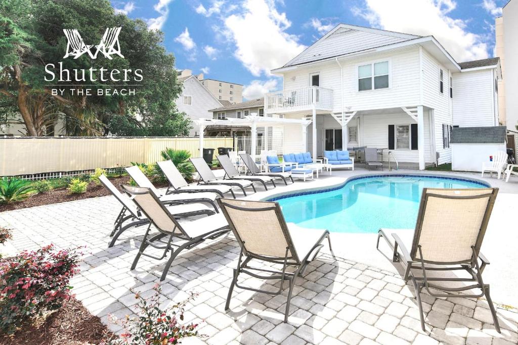Shutters By The Beach image
