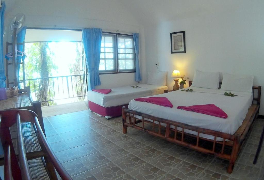 Poseidon Bungalows - Tap to explore photos