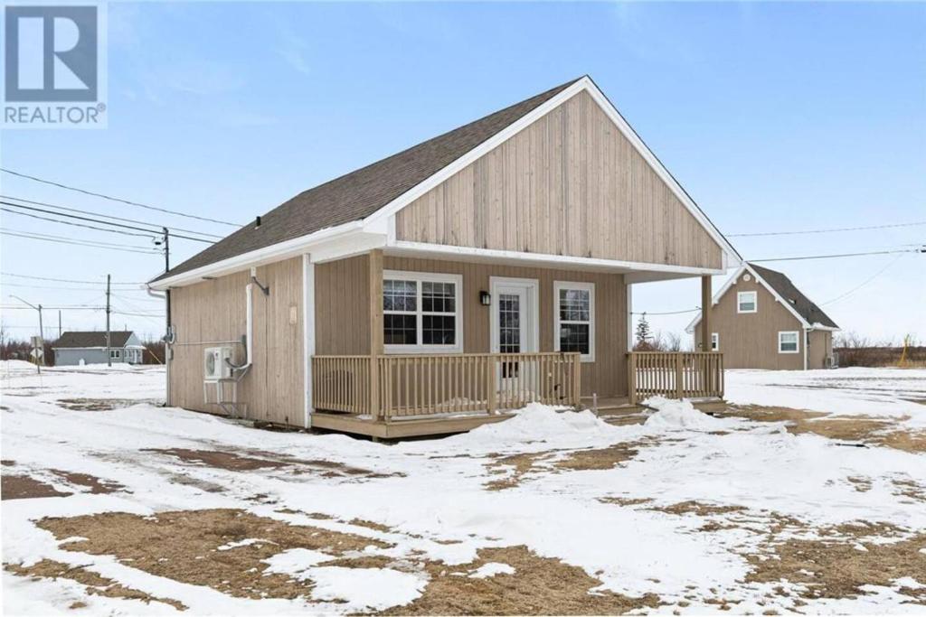 Seabreeze Aboiteau Cottage - beach access photo 2