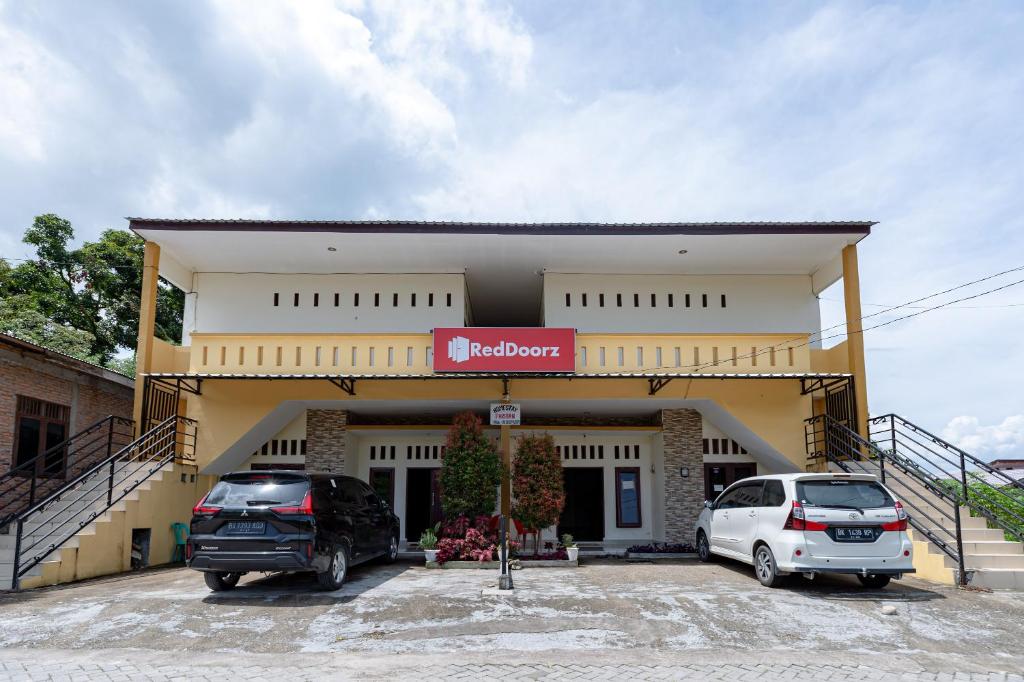 OYO 1694 Pariban Homestay - Tap to explore photos