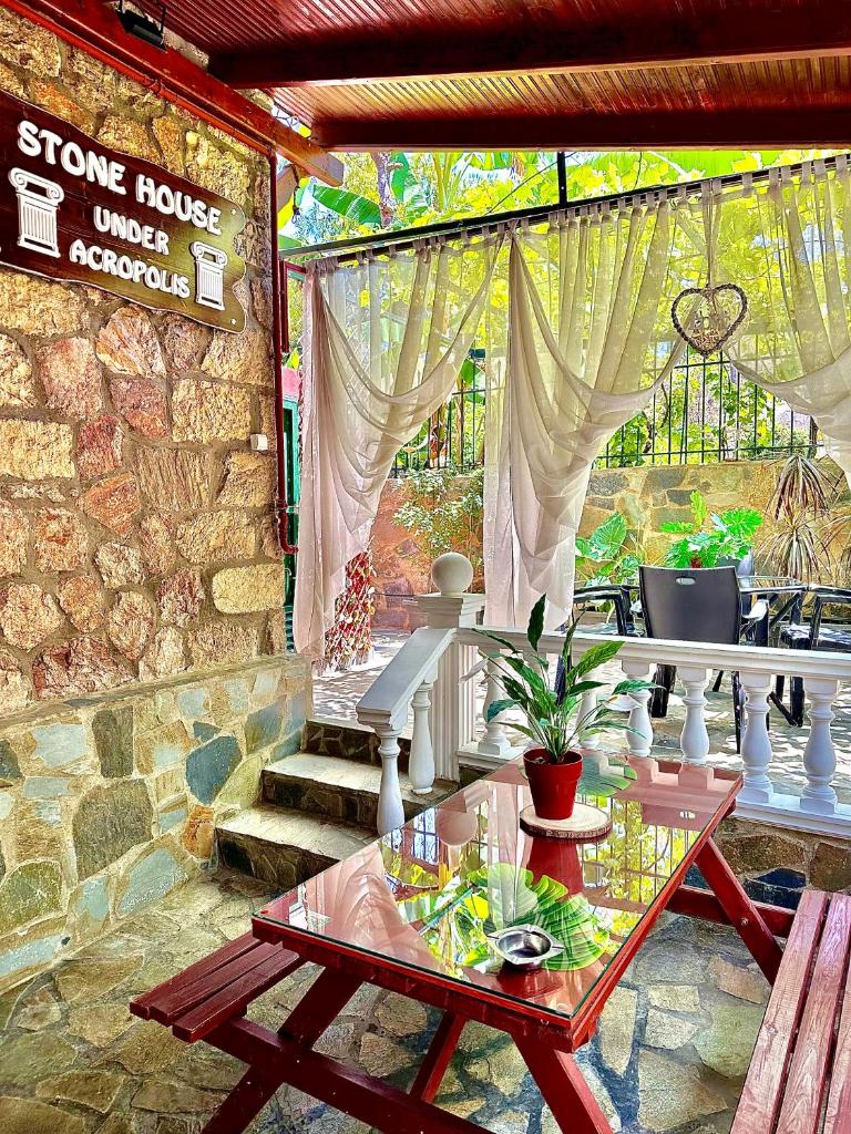 Stone house under Acropolis photo 2