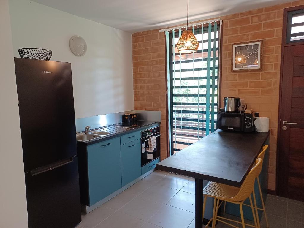Sous la Canopée Standing -Appartement Cosy- Cuisine équipée - CLIM- WIFI -NETFLIX photo 3