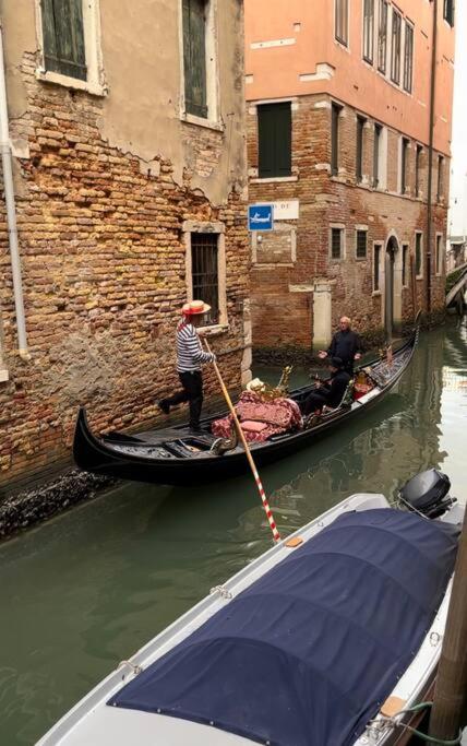 Dream's door with canal view in Venice - Tap to explore photos