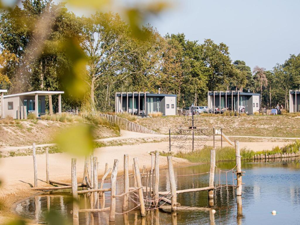 Chalet with a view of the beach or harbour, in a holiday park on the Leukermeer photo 1