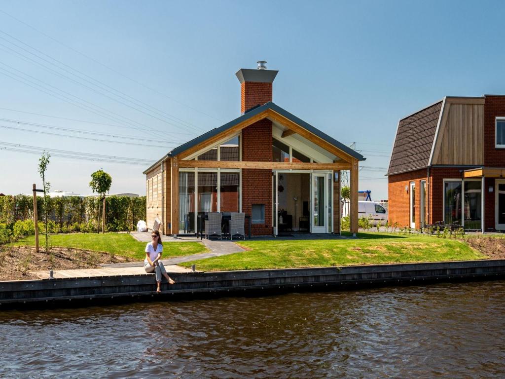 Disabled house on the water, on a holiday park in Friesland