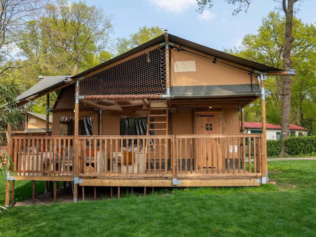XL Glamping tent with bathroom, in a holiday park right on a recreational lake photo 1