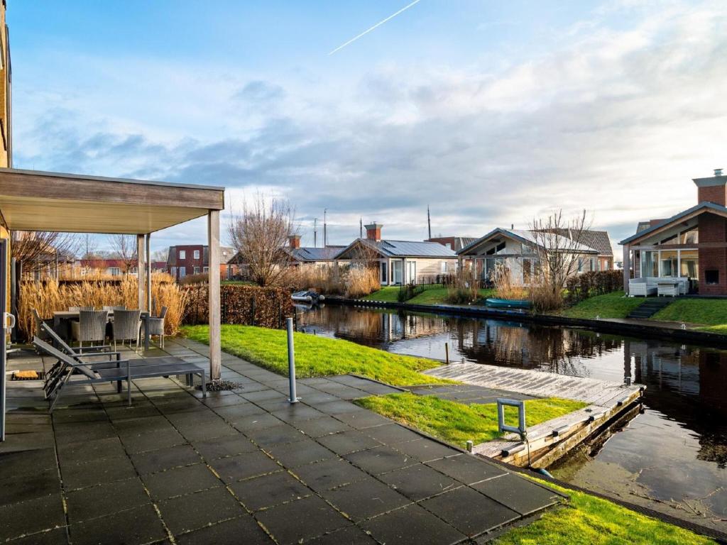 Stylish, modern holiday home with a terrace by the water photo 1