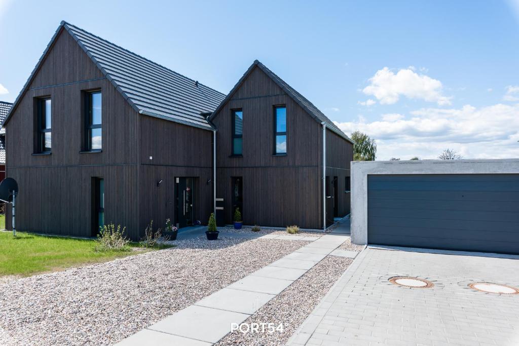 Lille sort hus photo 1