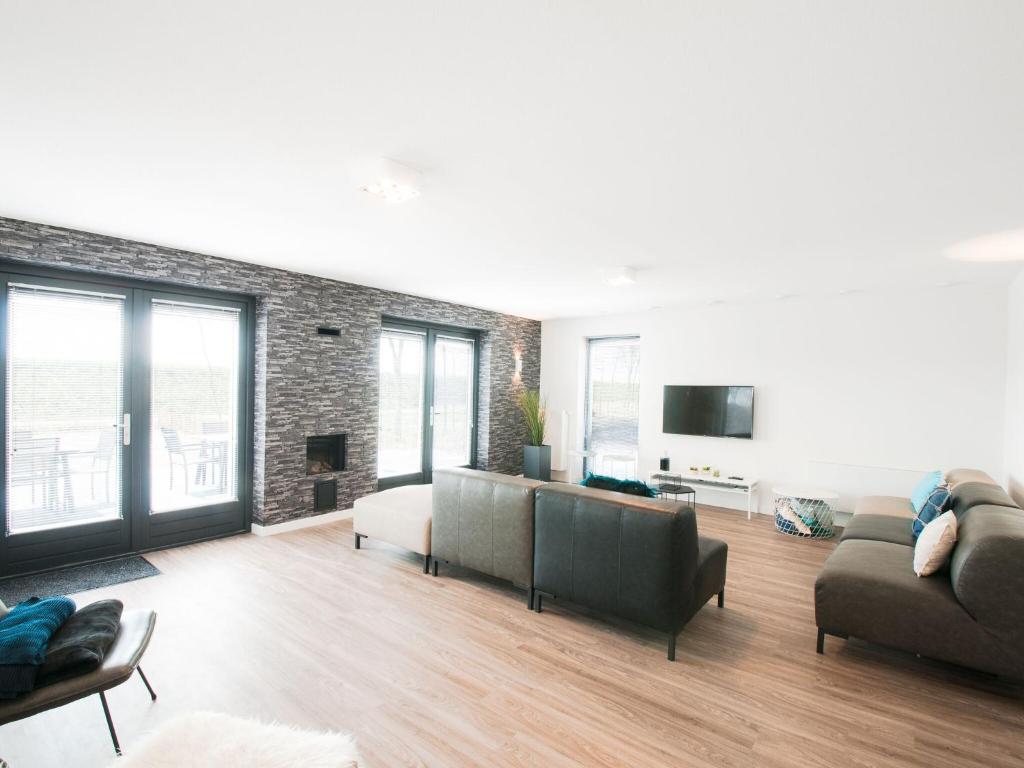Modern wellness lodge with sunshower in a national park photo 2