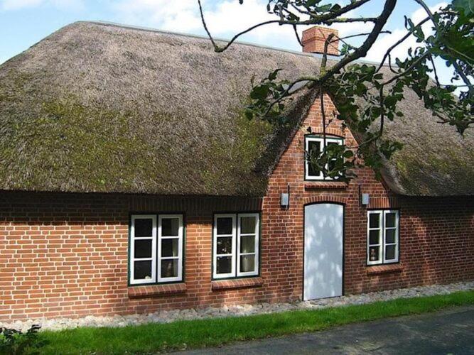 Holiday home in Westerhever with a fireplace and a beautiful garden