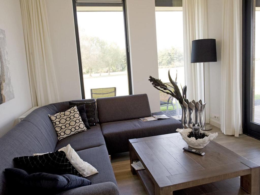 Modern design lodge on the water located on a holiday park in a national park photo 2