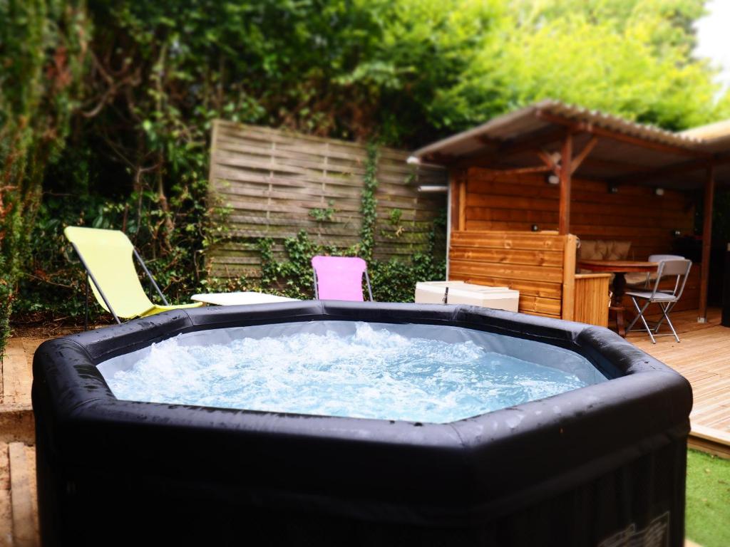 NOUVEAUTE 2023 Maison Cocooning avec jardin, Terrasse couverte et Jacuzzi photo 3