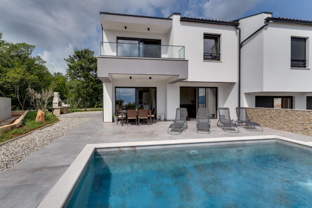 Villa Lavanda -semi-detached villa with a pool and a panoramic view, close to a sandy beach- by TRAVELER tourist agency Krk photo 3