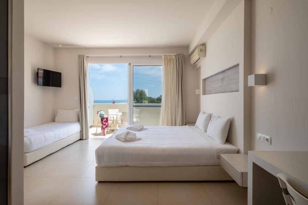 Dimitrios Village Beach Resort - Tap to explore photos