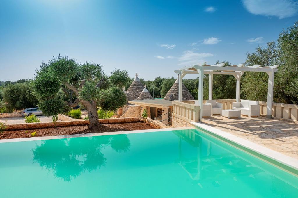 Trullo Encanto with pool photo 1