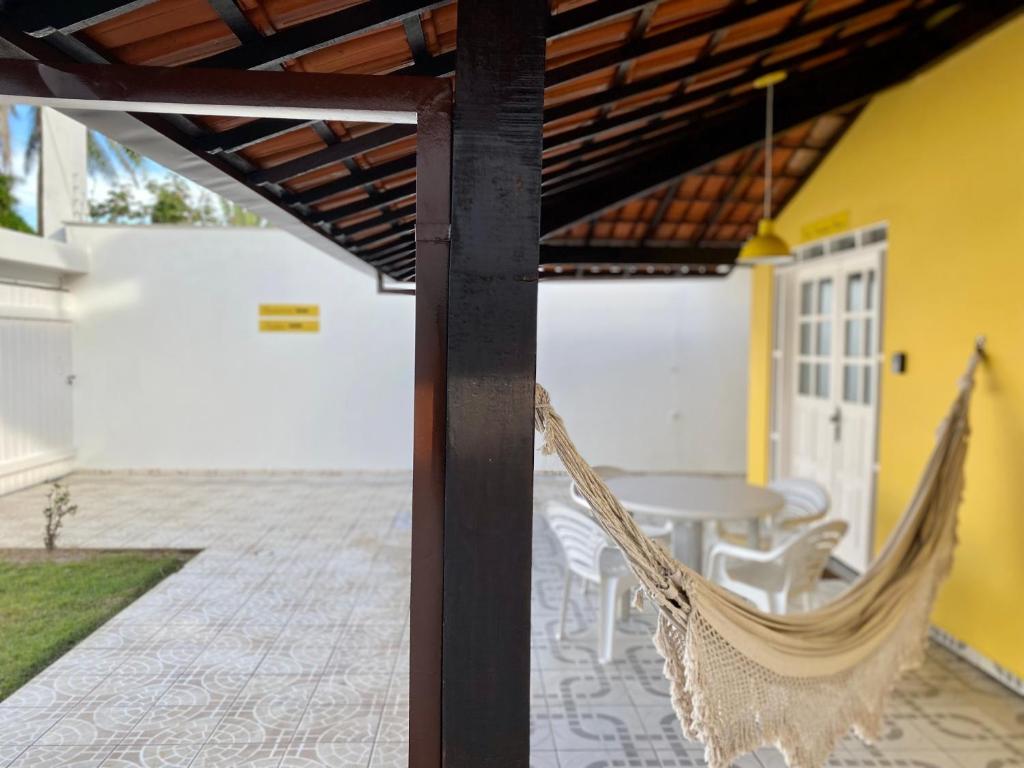 Kalug - DUPLEX com 3 QUARTOS em condomínio com PORTARIA 24 HORAS, WI-FI 200mbps e COZINHA COMPLETA na PRAIA DOS MILIONÁRIOS photo 2
