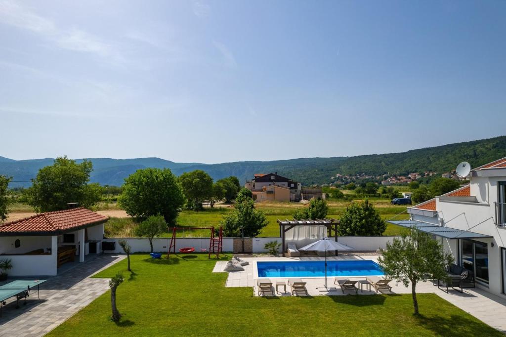 NEW Villa Anja is a 4 bedroom villa with a 32 sqm heated pool near Imotski photo 1