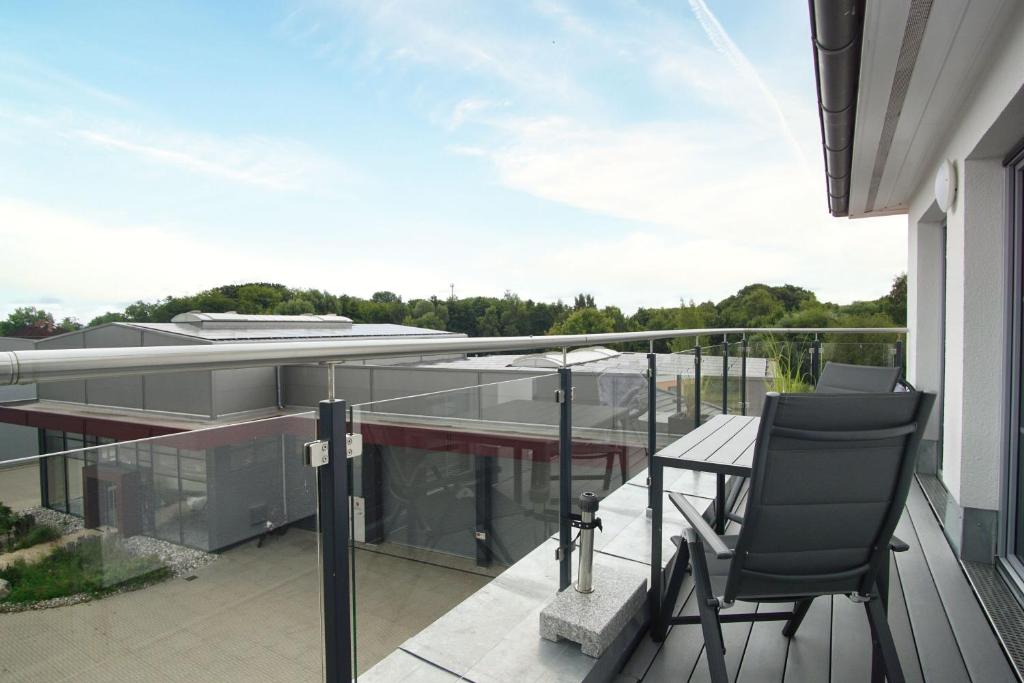 Modernen Ferienwohnung mit Balkon, Kamin - Alte Fischfabrik Lauterbach FeWo 13 photo 1