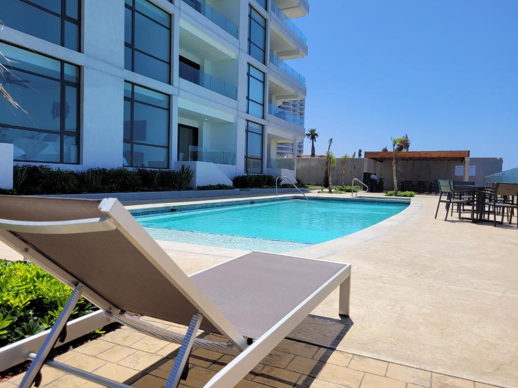 Luxury Beachfront Condo in Rosarito with Pool & Jacuzzi photo 1