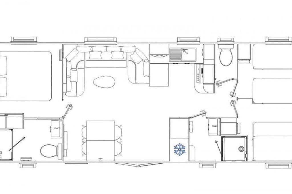 Modern holiday Chalet on lake side holiday park photo 2