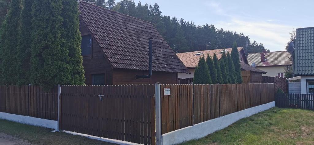 Dom drewniany z kominkiem i klimatyzacja lokalizacja trzy jeziora i lasy swornegacie photo 2