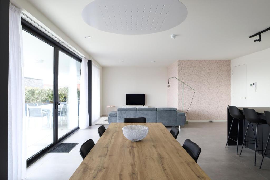 Design Apartment with 60m² terrace - heated inside pool and wellness facilities - very close to the beach photo 3
