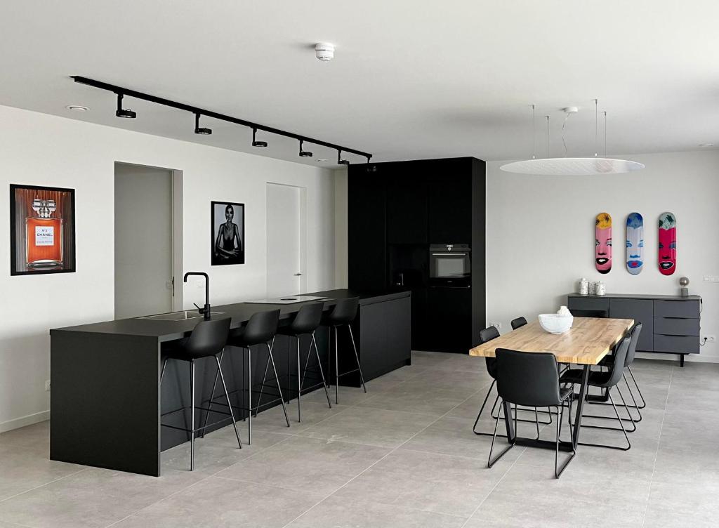 Design Apartment with 60m² terrace - heated inside pool and wellness facilities - very close to the beach photo 1