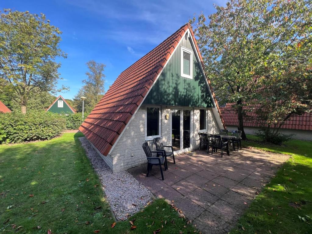 Het Familie Boshuisje - vakantiewoning op prachtig park met veel faciliteiten inc ligbad