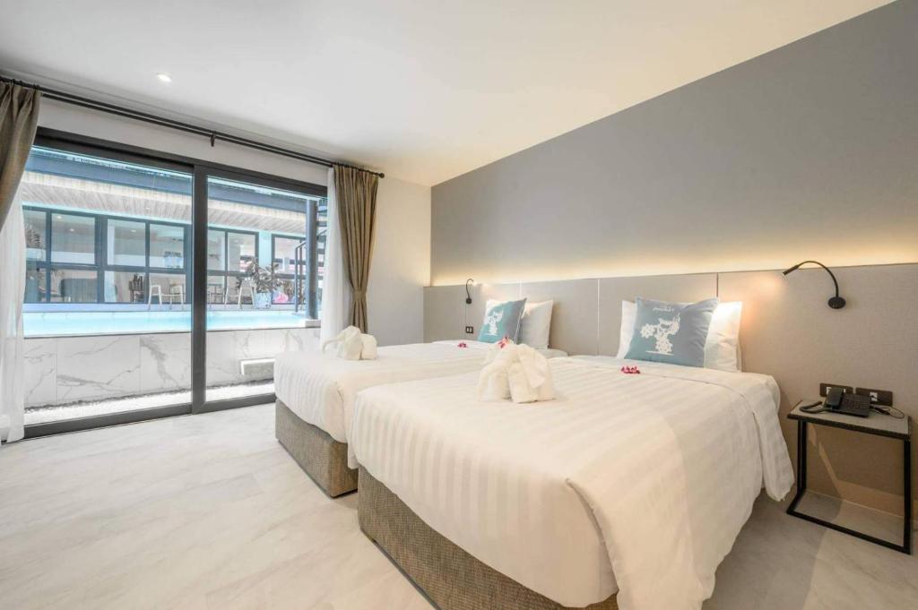 Tour De Phuket Hotel Room Type - Deluxe Double or Twin Room with Pool Access Tour De Phuket Hotel Room Type - Deluxe Double or Twin Room with Pool Access