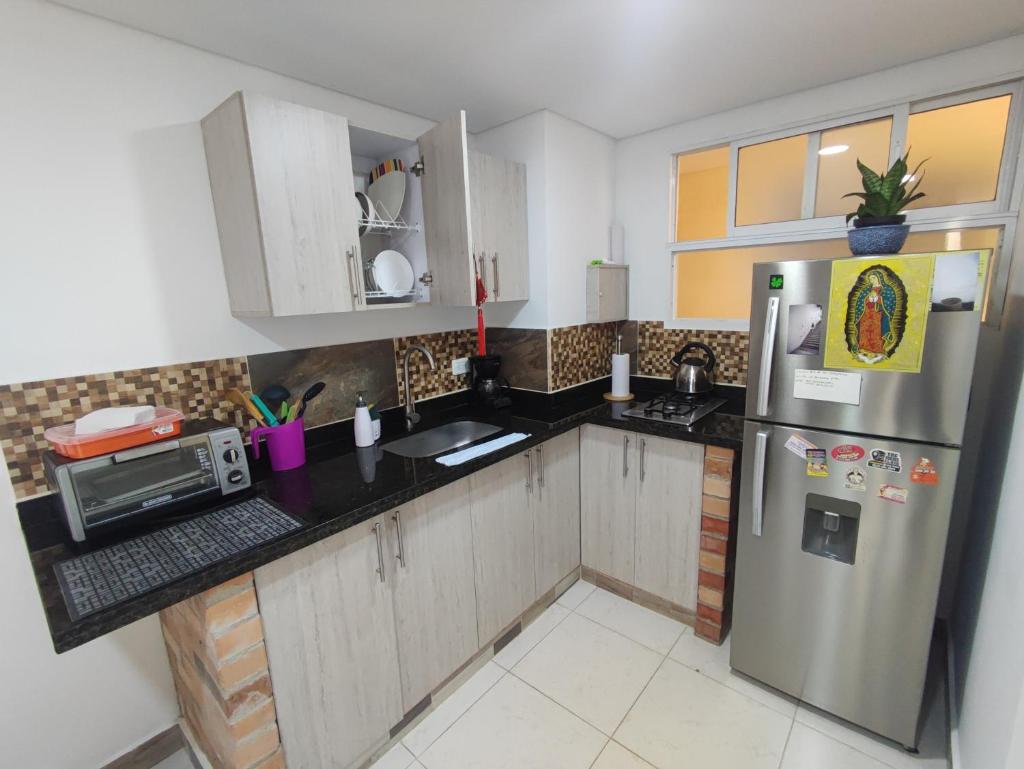 Beautiful and bright studio apartment with rooftop photo 2