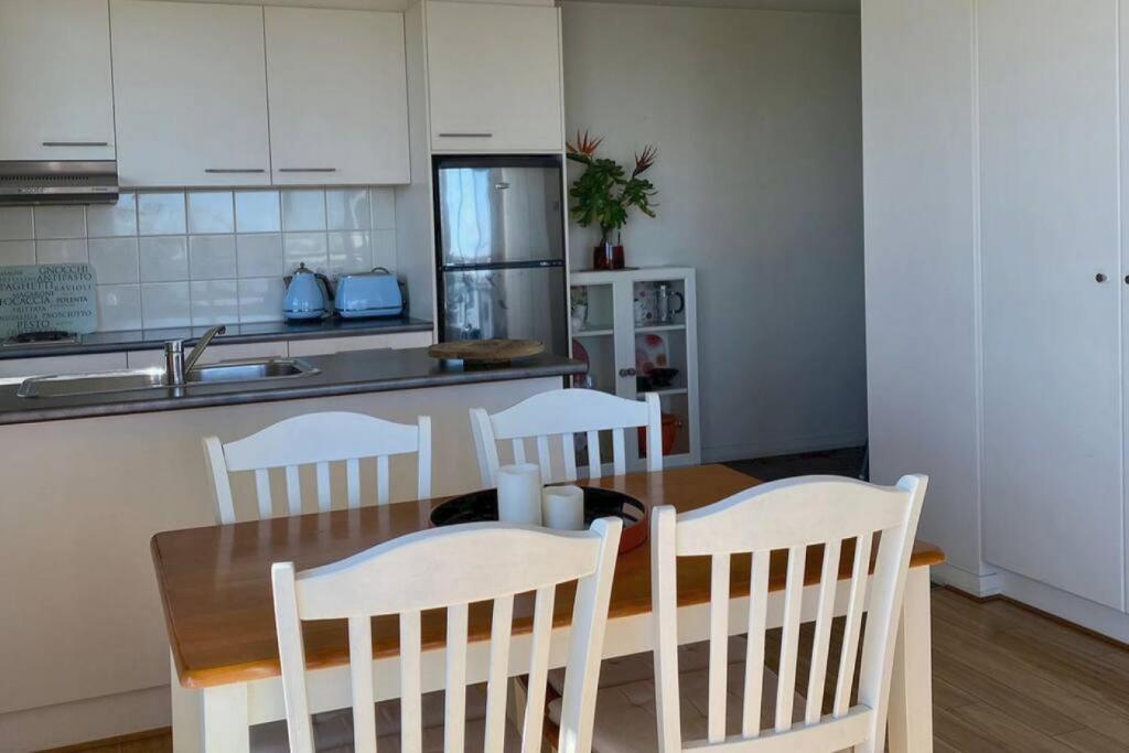 The East Ender 1BR Balcony City View - Tap to explore photos