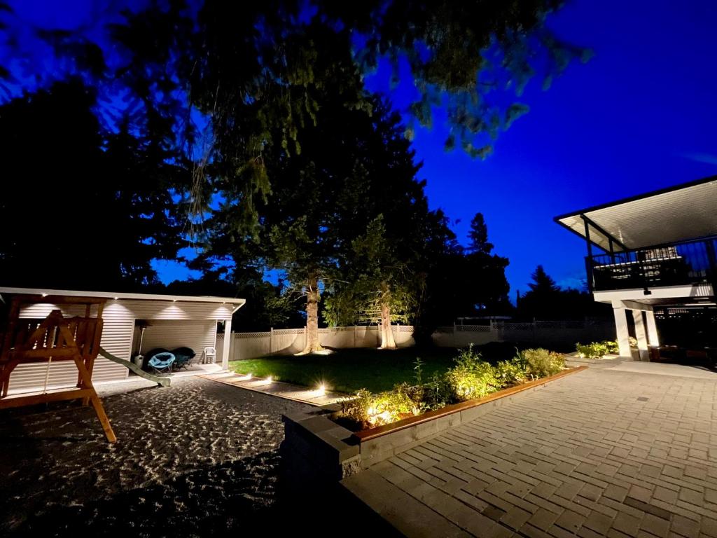 Brand New 2BR Suite with Mini Golf, Children Play Area, and Stunning Patio in Aldergrove photo 1