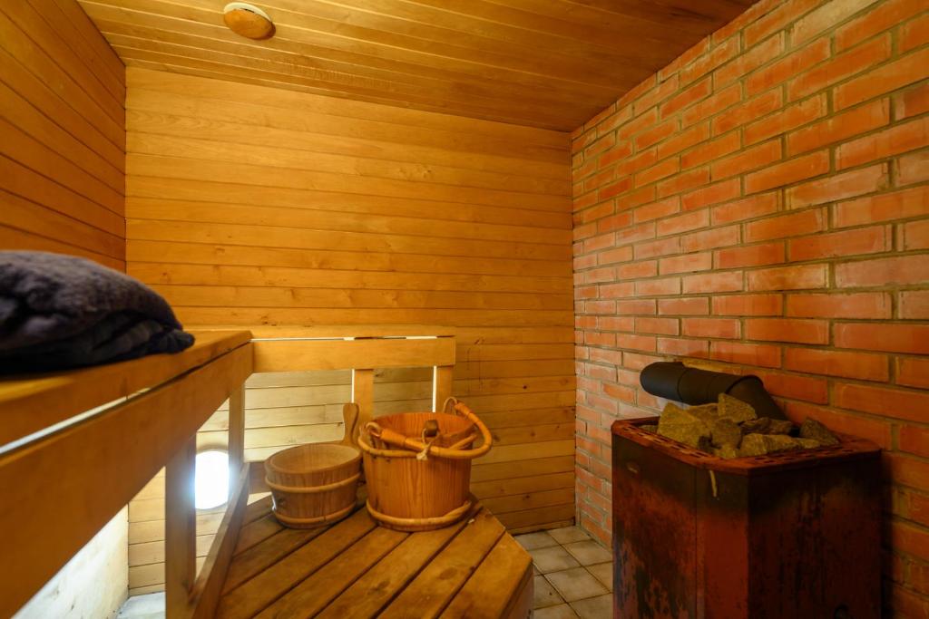 Log house with a sauna and hot tub in Atla!