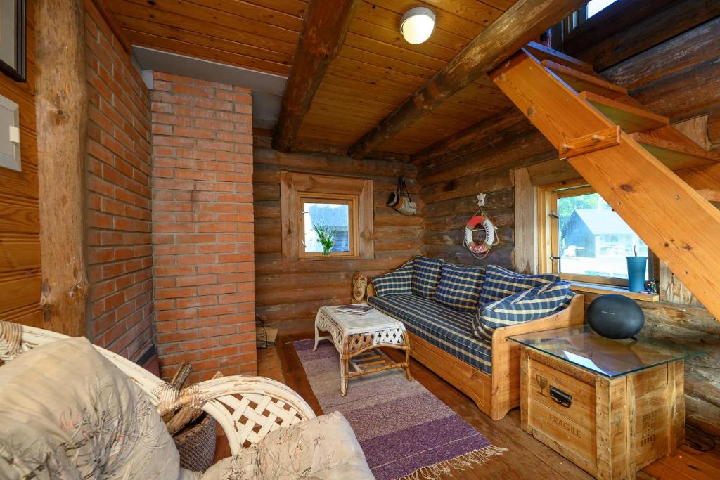 Log house with a sauna and hot tub in Atla! photo 1